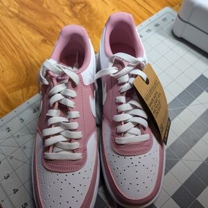 Nike Women's Low Dunk Pink and White Sneakers